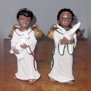 Vintage 1998 Princess House Angels. One holding a Dove and One holding a Lamb